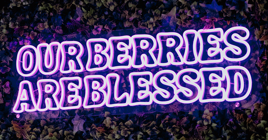 Our Berries Are Blessed — pink neon on florals