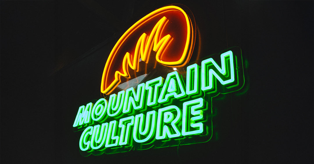 Mountain Culture, green and orange neon logo sign